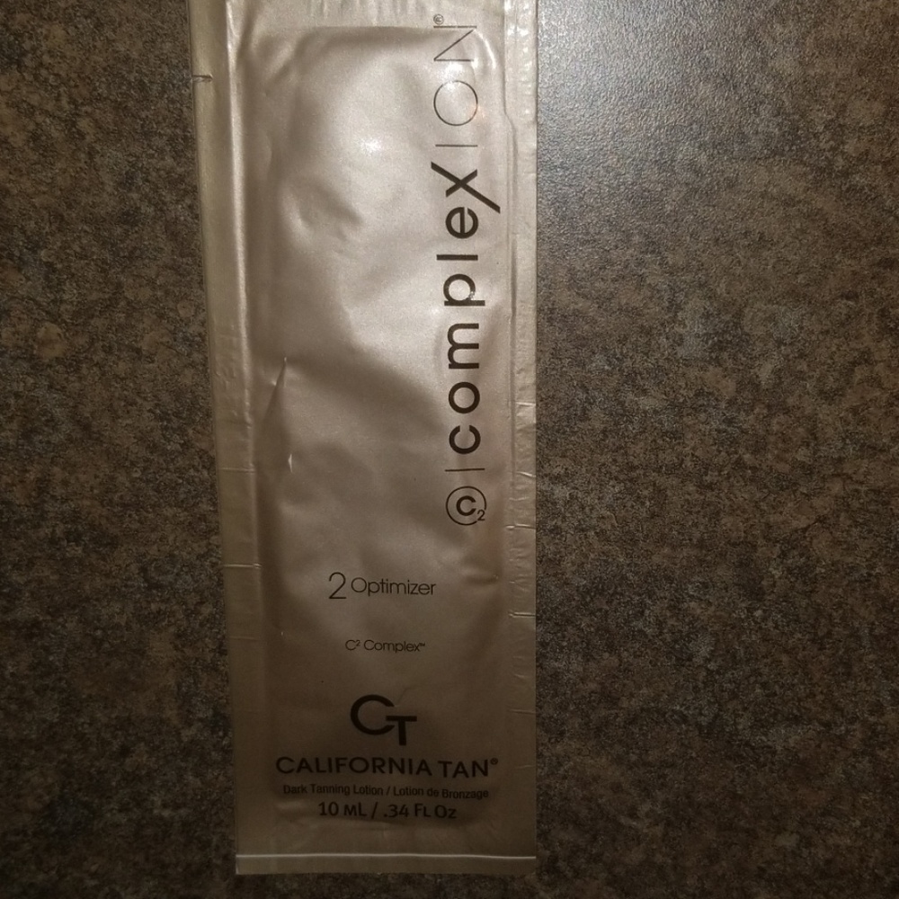 Complexion optimizer tanning lotion single packet